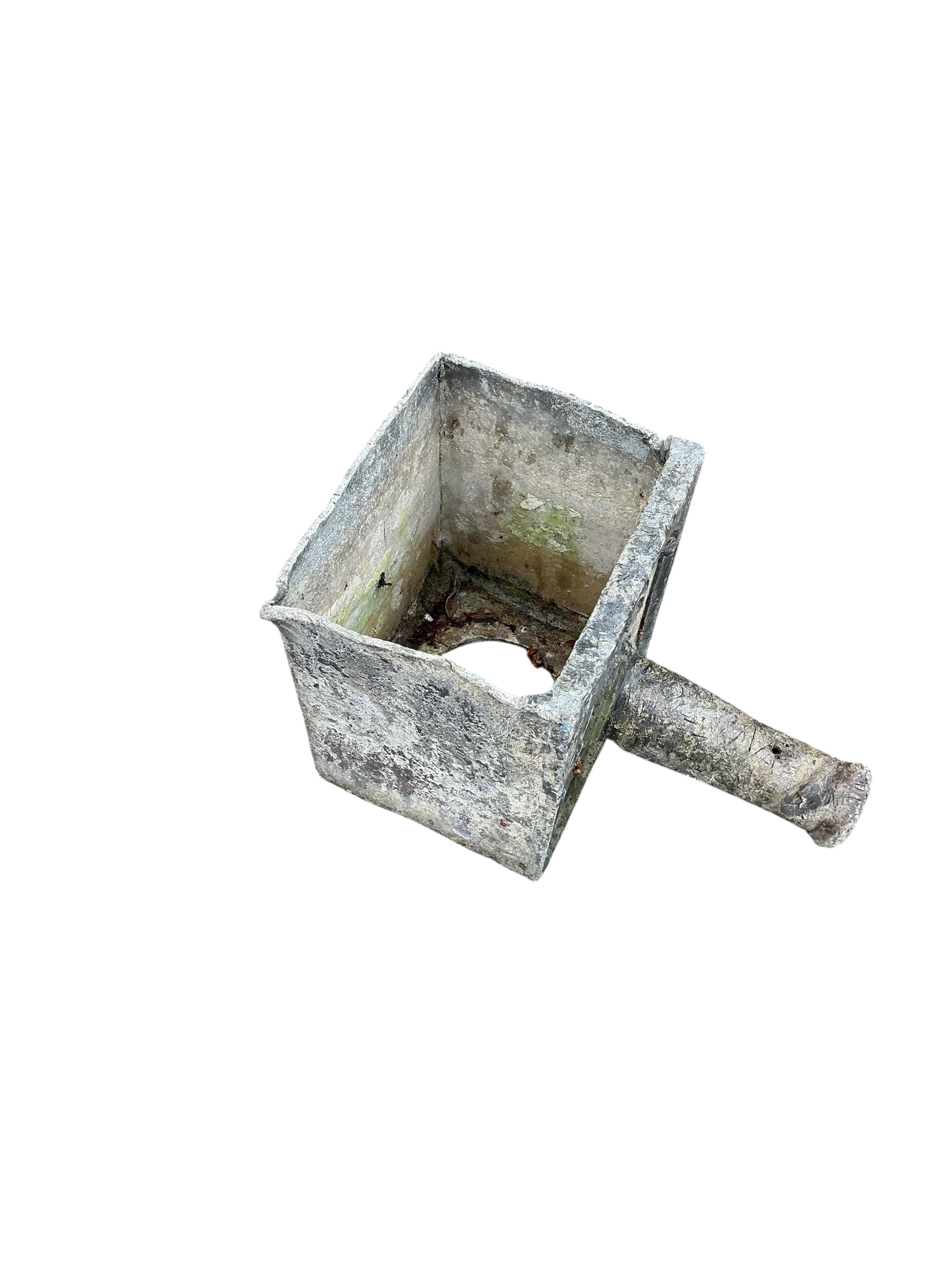 A George III lead hopper dated 1799 and initialled J.G., width 26cm, depth 40cm, height 30cm
